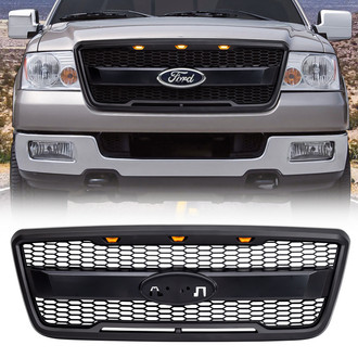 American Modified® - 1-Pc Raptor Style Matte Black Main Grille with Amber Lights and Emblem Base