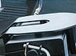 Anti-rattle skid plate for a smooth, quiet ride