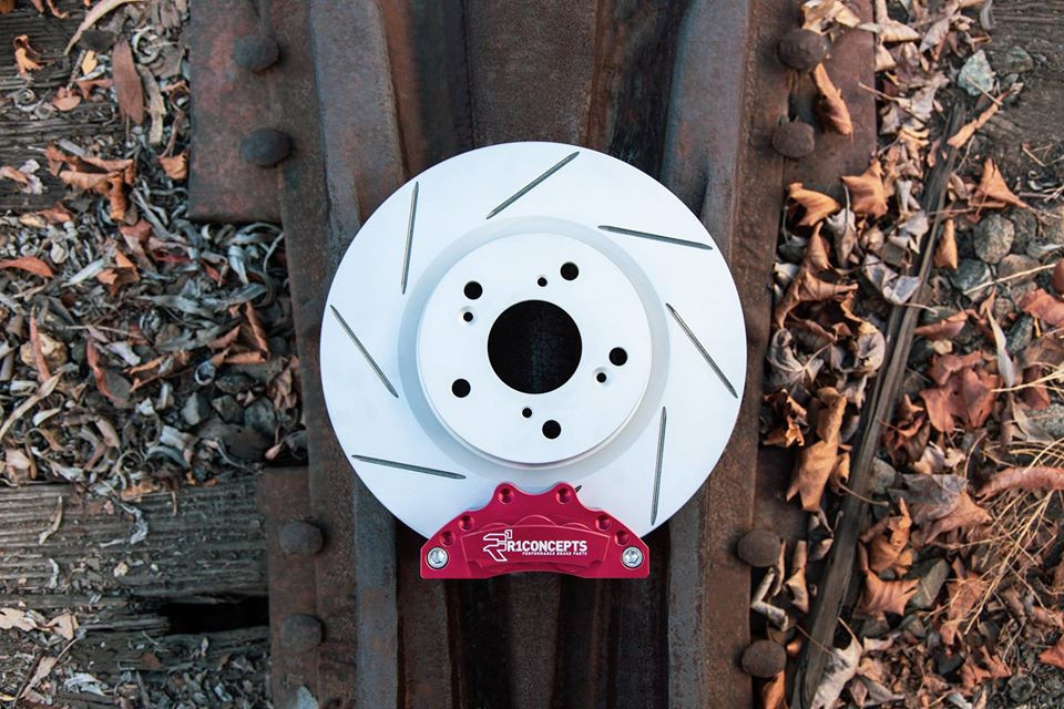 Slotted Rotor and Red Caliper