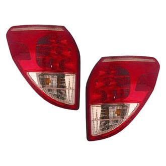 Replace® - Driver and Passenger Side Replacement Tail Light Lens and Housings (Value Line)