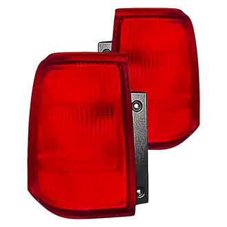 Replacement - Driver and Passenger Side Outer Tail Light Lens and Housing Set (Standard Line)