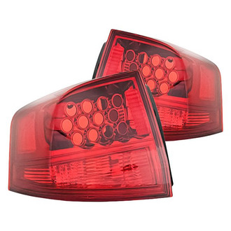 Replacement - Driver and Passenger Side Outer Tail Light Lens and Housing Set (Standard Line)