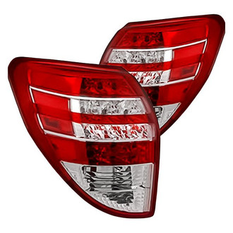 Replacement - Driver and Passenger Side Outer Tail Light Lens and Housing Set (Standard Line)