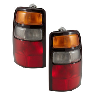 TYC® - Driver and Passenger Side Replacement Tail Light Lens and Housings (Standard Line)