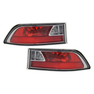 TYC® - Driver and Passenger Side Inner Replacement Backup Light Lens and Housings (CAPA Certified)