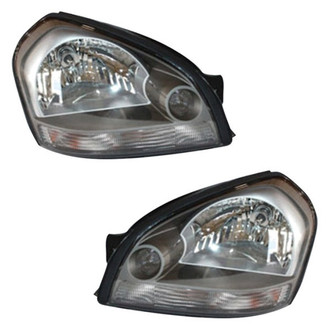 TYC® - Driver and Passenger Side Replacement Headlight Set (Standard Line)
