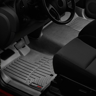 WeatherTech® - DigitalFit™ 1st Row (Over the Hump) Black Molded Floor Liner